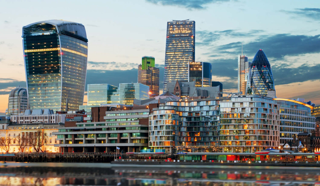 Evening skyline of apartments Walkie Talkie and Gherkin towers, London City Mortgages