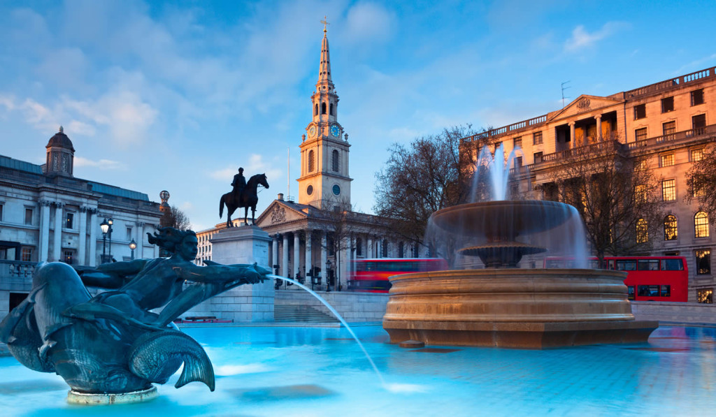 Fountains on Trafalgar Square at sunset, London City Mortgages