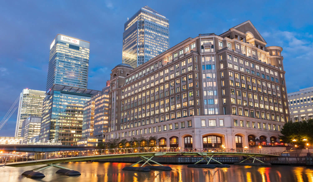 Illuminated modern buildings North Dock Canary Wharf, London City Mortgages