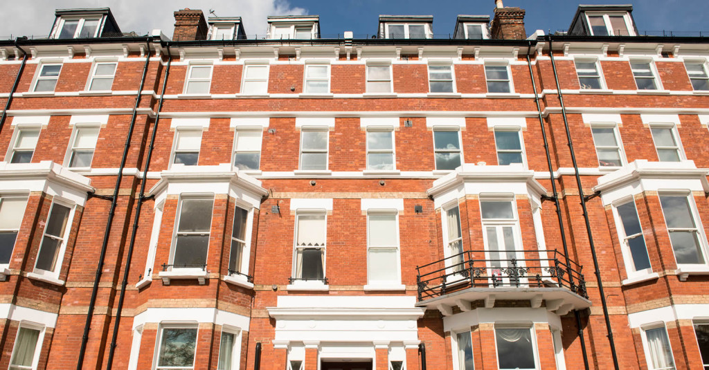 Luxury red brick apartment block West End of London City Mortgages