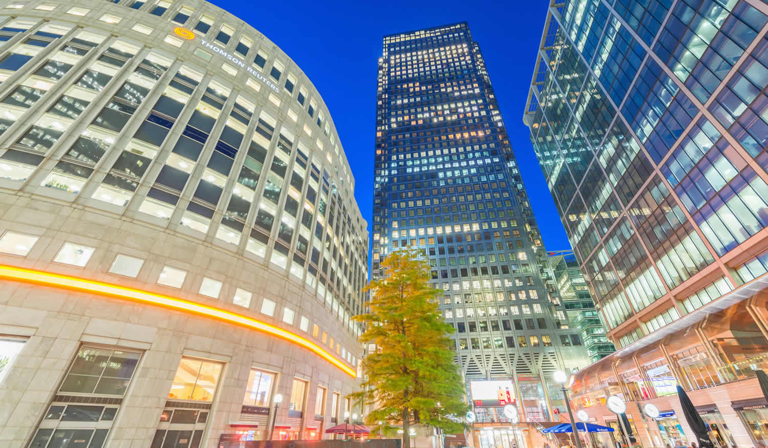Modern buildings and cafe restaurants Canary Wharf, London City Mortgages