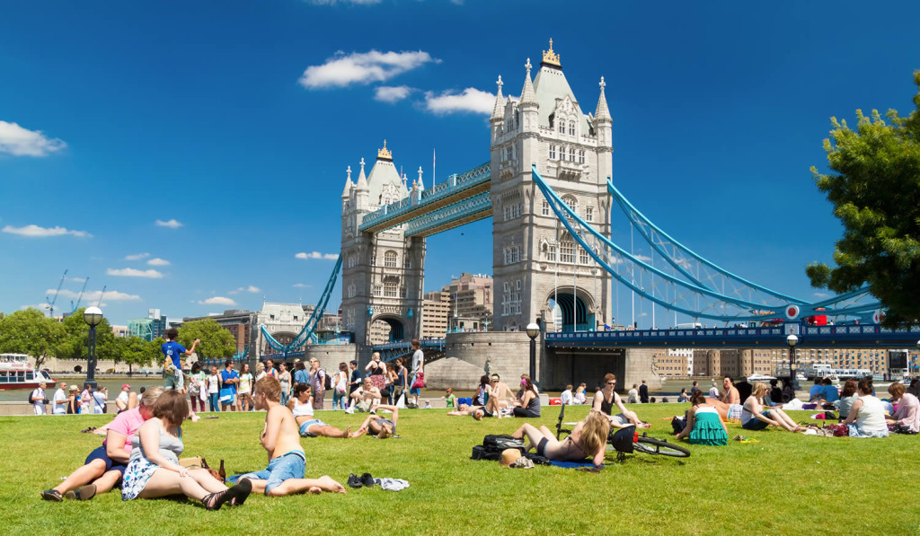 People enjoying a sunny day at Tower Bridge, London City Mortgages