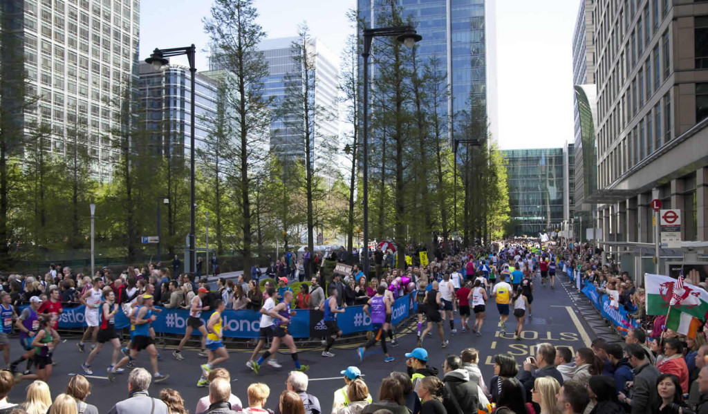 Runners in the marathon through Canary Wharf, London City Mortgages