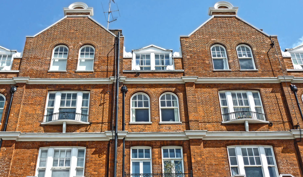 Apartments in typical red brick building London City Mortgages