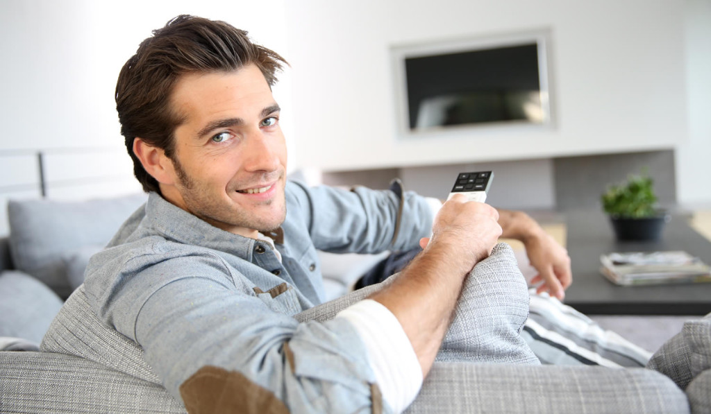 Homeowner relaxing in livingroom London City Mortgages