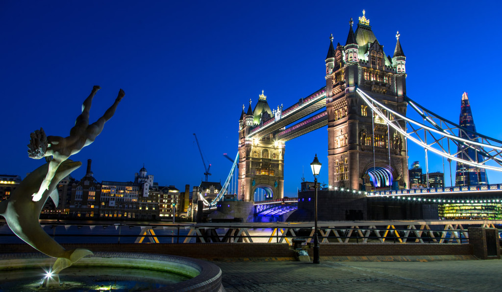 Statue Tower Bridge and Shard at night London City Mortgages