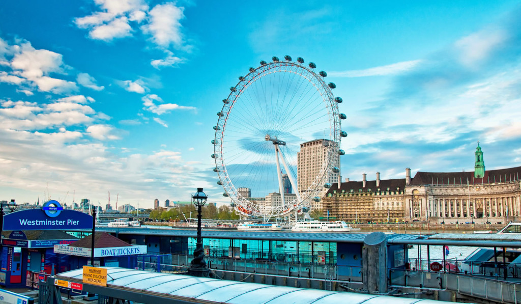 Westminster pier viewing the Eye Thames river London City Mortgages